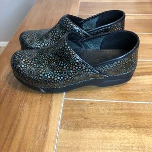 Dansko clogs with colorful swirl design